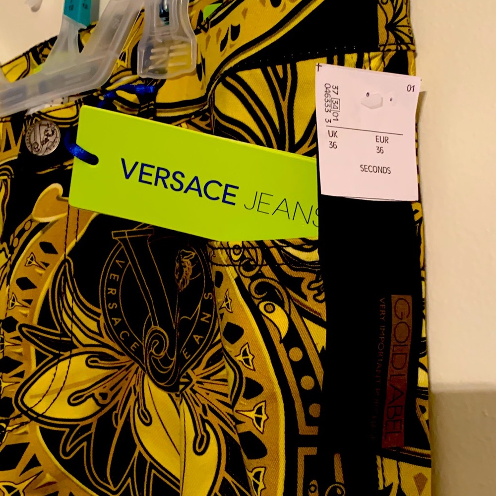 Versace pants black n gold super fashionable